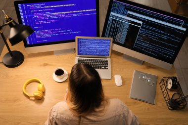 Transgender programmer working in server room