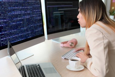 Transgender programmer working in office