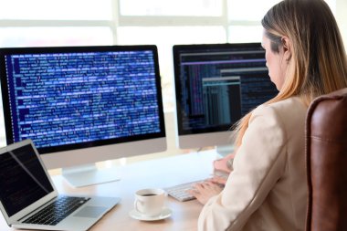Transgender programmer working in office