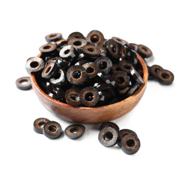 Bowl of cut black olives on white background
