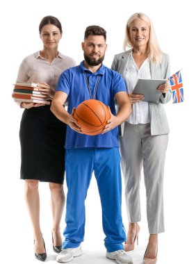 Teachers with UK flag, books and ball on white background