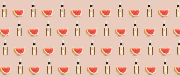 Many Bottles Grapefruit Essential Oil Beige Background Pattern Design — 图库照片