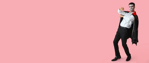 Man Dressed Vampire Halloween Pink Background Space Text — Stockfoto
