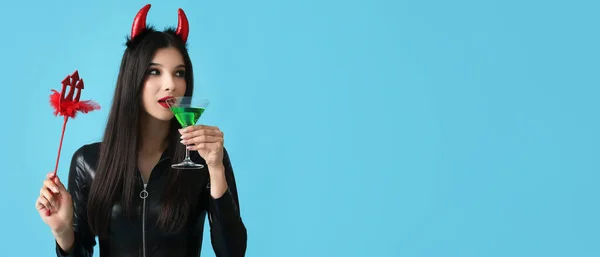 Beautiful Young Woman Halloween Costume Drinking Cocktail Blue Background Space — Photo