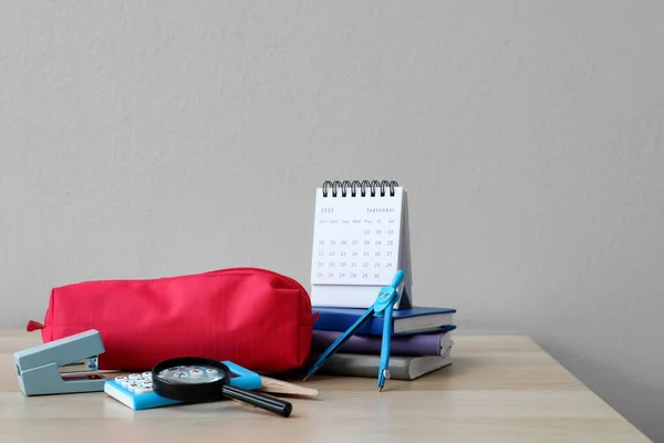 Red Pencil Case School Stationery Calendar Table Grey Background — Stock Photo, Image