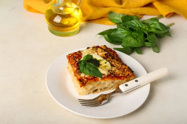 Plate Tasty Italian Pie Mozzarella Pesto Sauce Light Background — Stockfoto