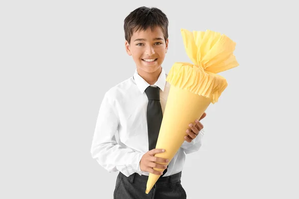 Little Boy Yellow School Cone Light Background — Foto Stock