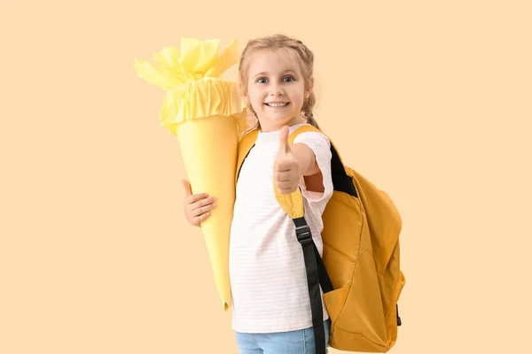 Cute Little Girl Yellow School Cone Backpack Showing Thumb Beige — Stock Photo, Image