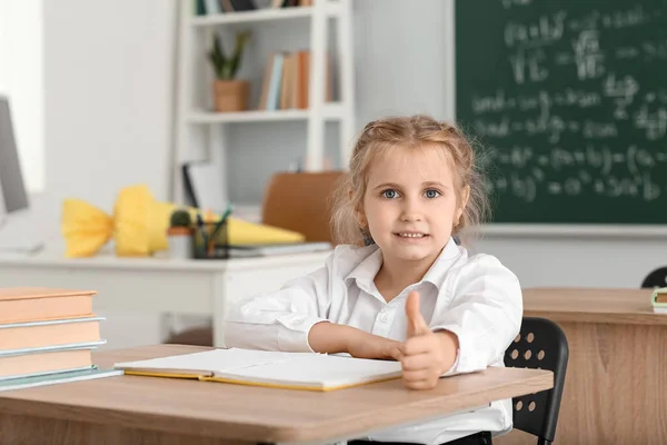 Cute Little First Grader Showing Thumb Desk Classroom — Fotografia de Stock