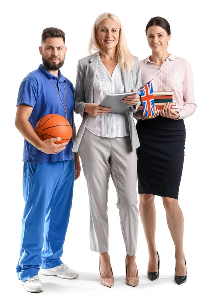 Teachers with UK flag, books and ball on white background