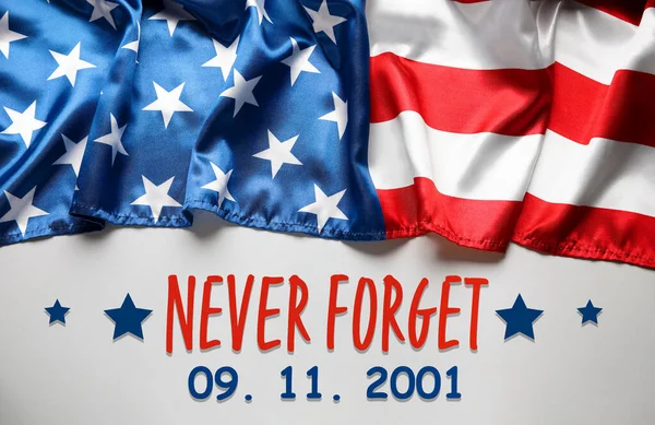USA flag on grey background, top view. National Day of Prayer and Remembrance for the Victims of the Terrorist Attacks 
