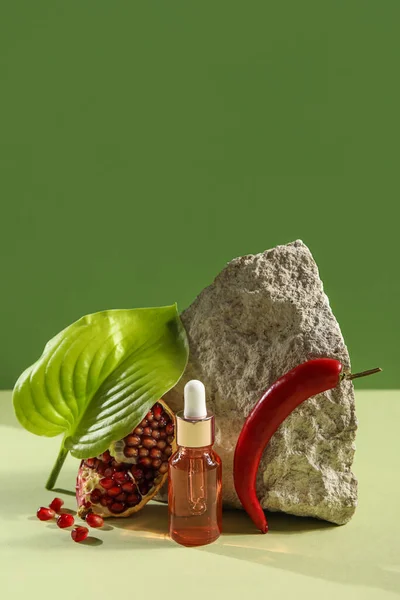 Composition Bottle Essential Oil Pomegranate Chili Pepper Plant Leaf Color — Stock Fotó
