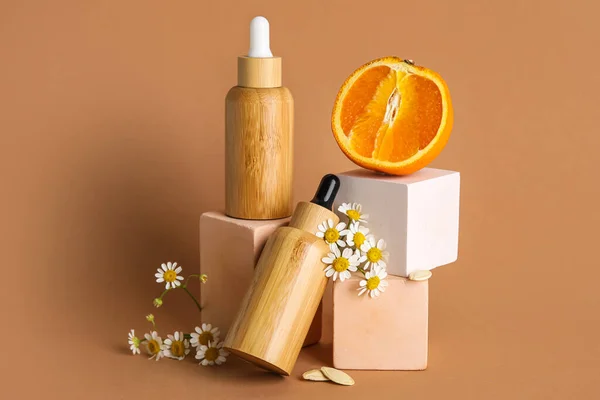 Composition Bottles Essential Oil Orange Chamomile Flowers Plaster Decor Color — Stok fotoğraf