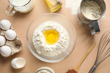 Set of ingredients for baking on color background