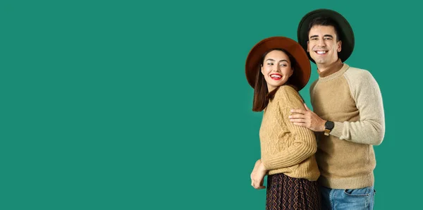 Happy Young Couple Autumn Sweaters Green Background Space Text — Stockfoto