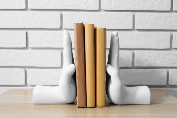 Stylish Holder Books Table White Brick Wall — Stock Photo, Image