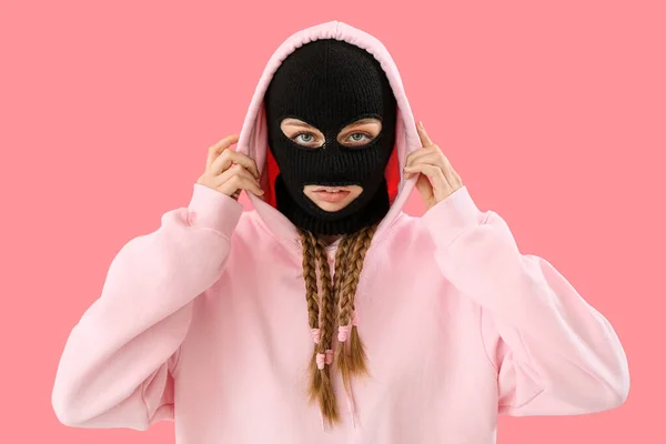 Young Woman Balaclava Adjusting Hood Pink Background — Stock Photo, Image