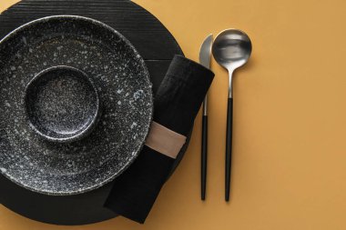 Trendy table setting on beige background