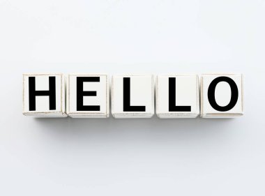 Word HELLO made of cubes on white background, top view