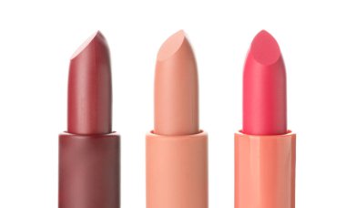 Set of beautiful lipsticks on white background, closeup
