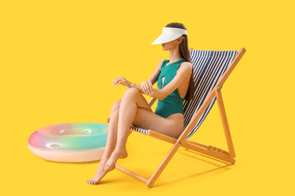 Beautiful Young Woman Swimsuit Relaxing Deck Chair Yellow Background — Stock Photo, Image