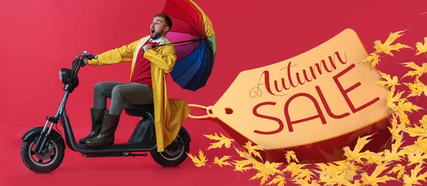 Surprised man in raincoat and with umbrella riding scooter on red background. Banner for autumn sale