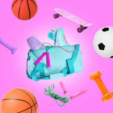 Flying sports bag and different equipment on pink background
