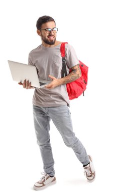 Handsome tattooed student with laptop isolated on white