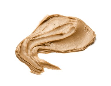 Stroke of nut butter on white background