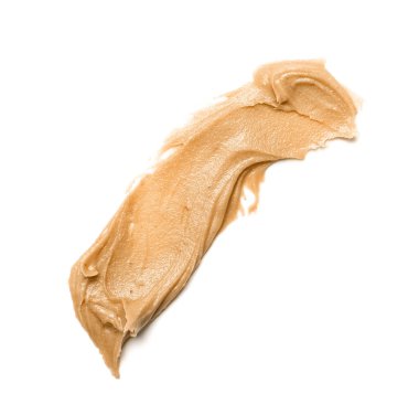 Stroke of nut butter on white background