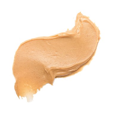 Stroke of nut butter on white background