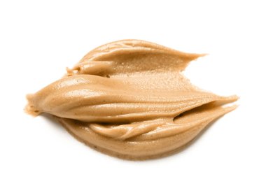 Stroke of nut butter on white background
