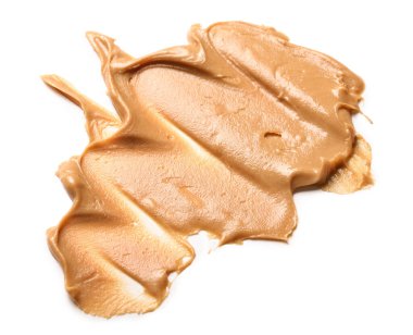 Stroke of nut butter on white background
