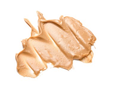 Stroke of nut butter on white background