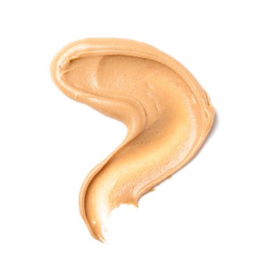 Stroke of nut butter on white background