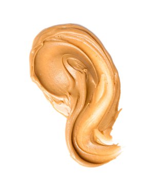Stroke of nut butter on white background