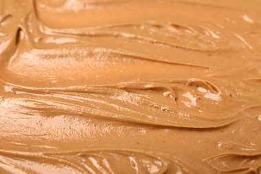 Texture of nut butter as background, closeup
