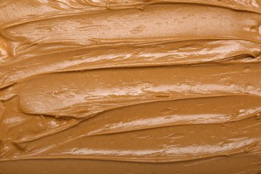 Texture of nut butter as background, closeup