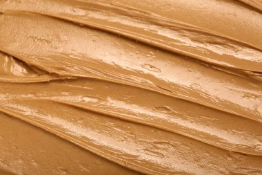 Texture of nut butter as background, closeup