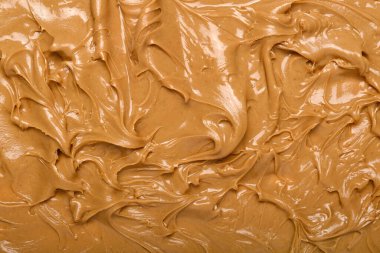 Texture of nut butter as background, closeup