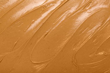 Texture of nut butter as background, closeup