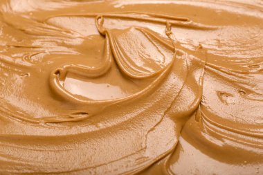 Texture of nut butter as background, closeup