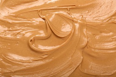 Texture of nut butter as background, closeup