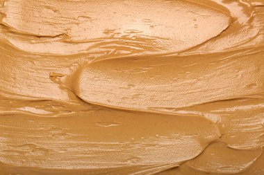 Texture of nut butter as background, closeup