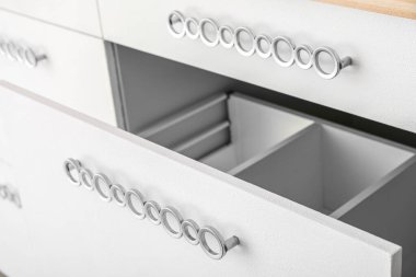 Open empty drawer in kitchen, closeup