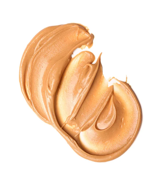 Stroke of nut butter on white background