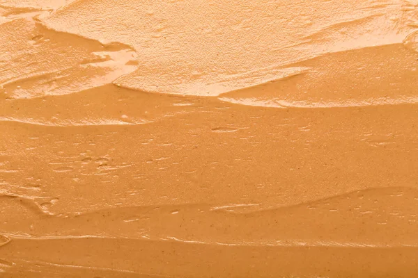Texture of nut butter as background, closeup