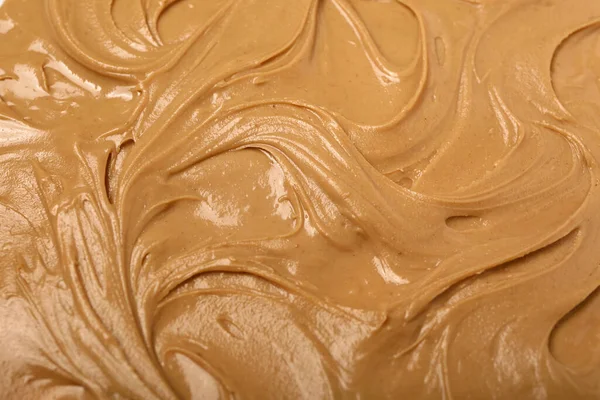 Texture of nut butter as background, closeup