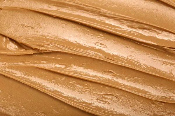 Texture of nut butter as background, closeup