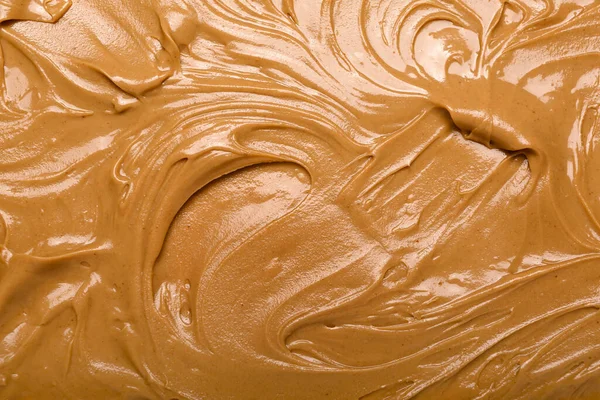 Texture of nut butter as background, closeup